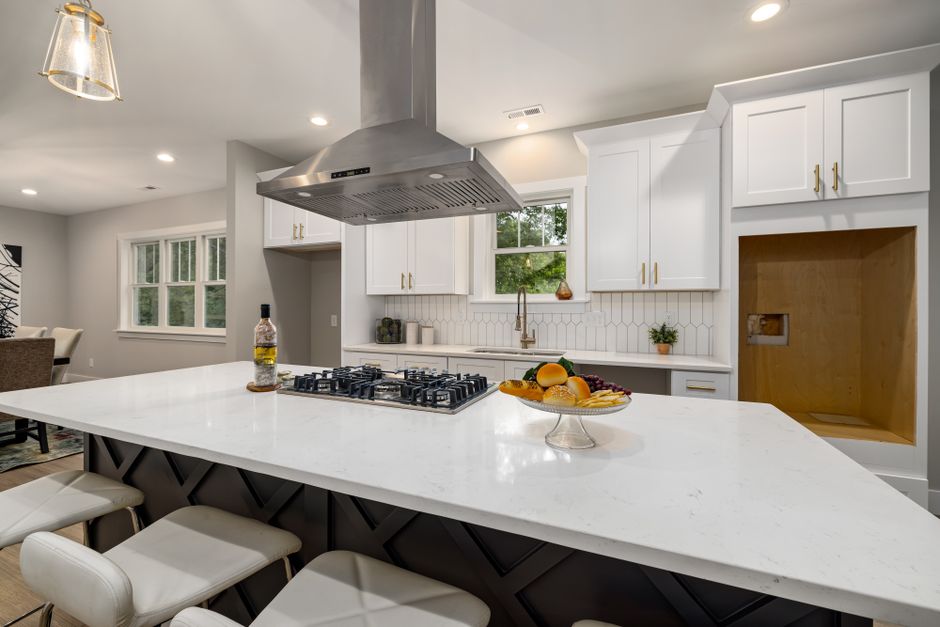 Remodeled home interior with cabinets and natural light