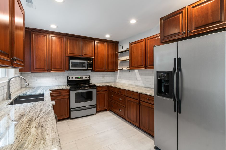 Remodeled home interior with cabinets and natural light