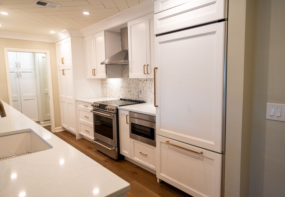 Remodeled home interior with cabinets and natural light