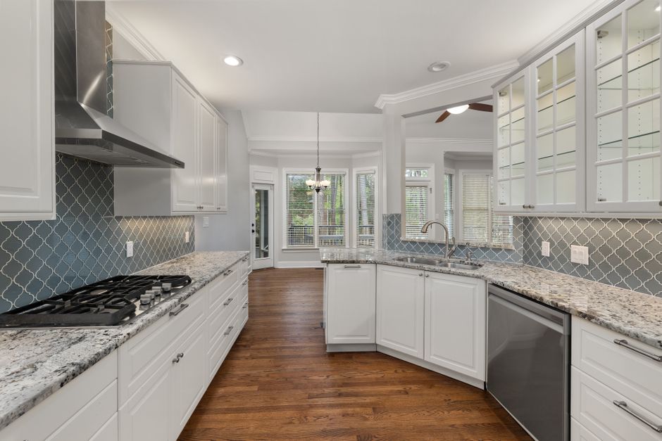 Remodeled home interior with cabinets and natural light