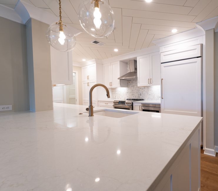 Remodeled home interior with cabinets and natural light